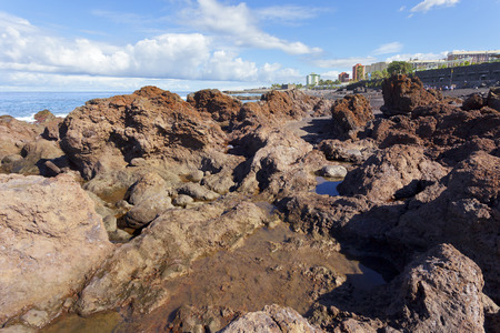 Rocky sea coast in Puerto de la Cruz, Tenerife / Spain, december 2012の写真素材