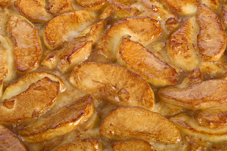 Cake with pieces of apple, surface view as a food background, focus stacking.の写真素材