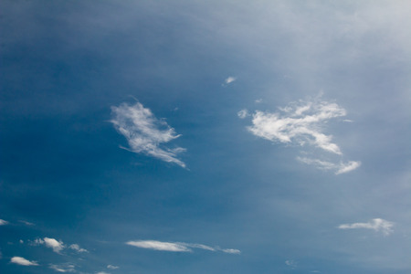 The cloudy blue sky