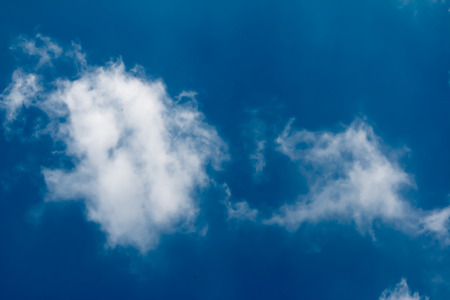 The cloudy blue sky.