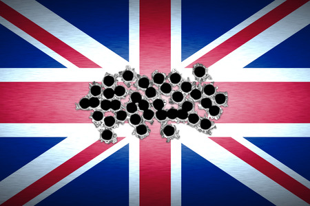 shotgun bullet hole on united kingdom flag. metal background. concept design.の写真素材