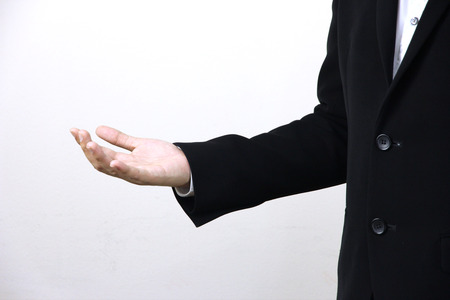 business man acting his hands on white background.の写真素材