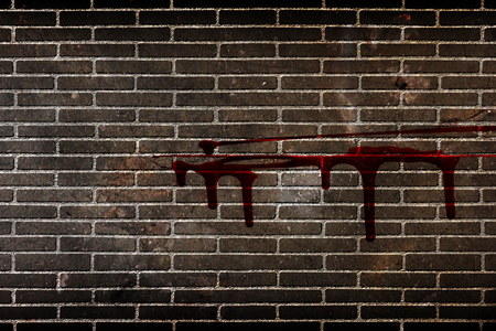 bloody brick wall  in the dark for horror content and halloween festival. 3d illustration.の写真素材