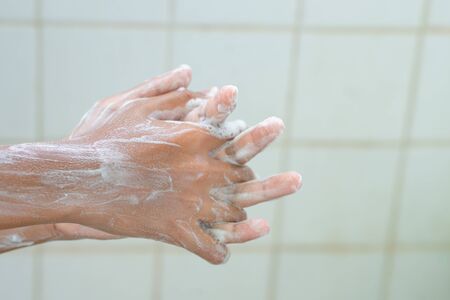 Frequent washing of hands With soap or alcohol gel to prevent the virusの写真素材