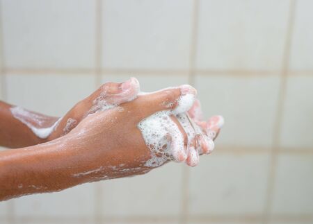 Frequent washing of hands With soap or alcohol gel to prevent the virusの写真素材