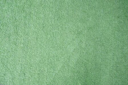 Green doormat made of artificial grassの写真素材