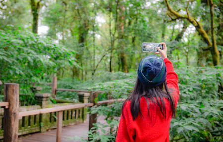 Young female tourists taking a selfie while watching nature