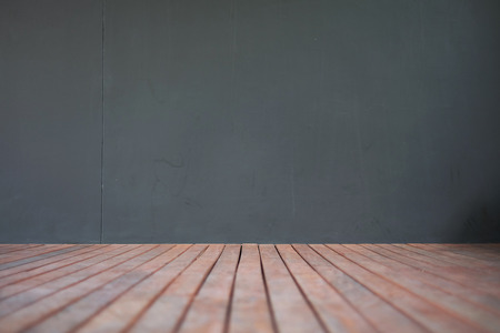 Empty wooden floor and grey wallの写真素材
