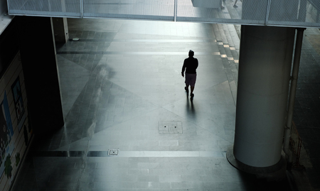 Man walking on streetの写真素材