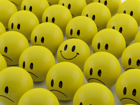 Happy Smiliey among yellow sad smiliesの写真素材