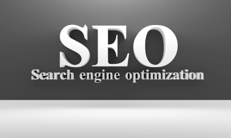 3D room with black wall. SEO and Search engine optimization text on the wallの写真素材