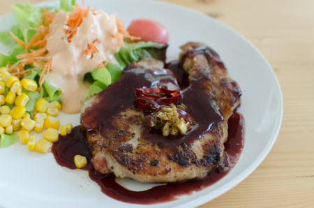 Kurobuta steak black pork with berry sauceの写真素材