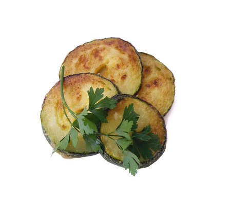 Fried zucchini slices on a white backgroundの写真素材