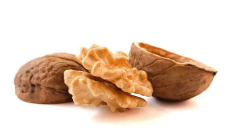 Walnut kernel with shell. Walnut isolated on white background.