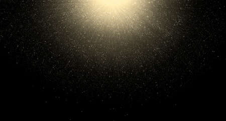 Sunbeams and Shining particles on black background. Stardust stock photo