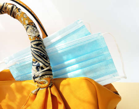 Medical protective mask in women's yellow bag