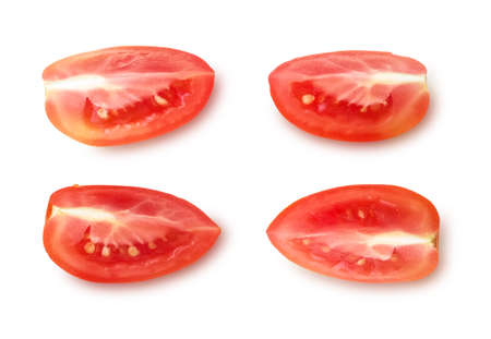 Four slices of tomato isolated on white backgroundの写真素材