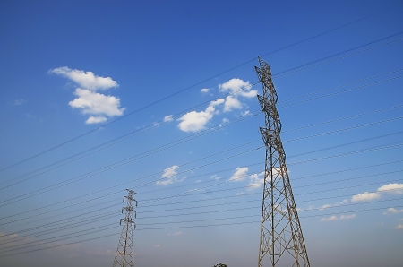 electricity post with blue sky の写真素材