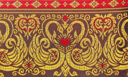 golden swan pattern on cloth fabric
