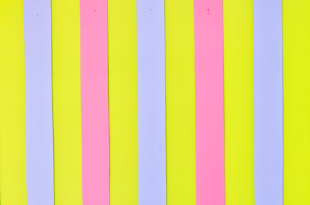 wood wall background color blue pink and yellow の写真素材