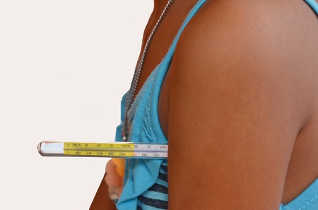 Girl test body temperature for diagnosis.