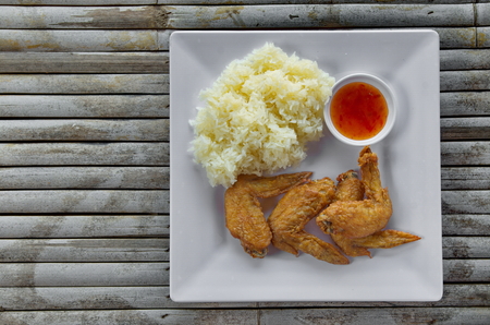 Chicken fried rice on bamboo table.の写真素材