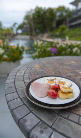 bacon, egg omelet and pancake american breakfastの写真素材