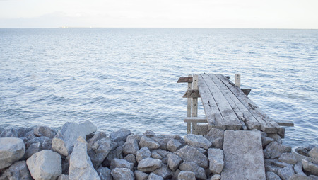 Stone embankment to prevent the waves of the sea.の写真素材