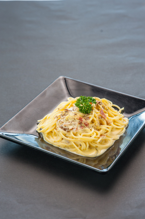 Spaghetti Carbonara with bacon and cheeseの写真素材