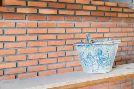 bucket and bricks. Under construction.の写真素材