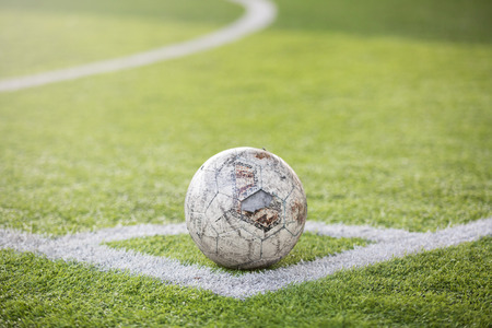Ball on corner of football field for kick to goal area.の写真素材