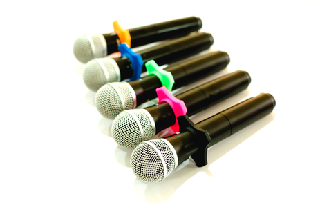Wireless microphones for conference in meeting room. It is isolated on white background.の写真素材
