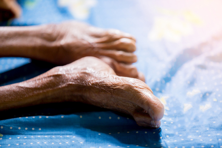 Leg of old woman sleep in bed. Wrinkles of old woman skin.の素材 [FY310110672685]