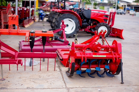 Equipment for soil conditioner agriculture. Modern red tractor for Agricultural machinery.の写真素材