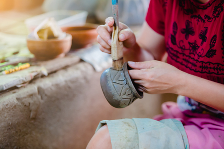 Pottery carving, Carving clay for make earthenwareの写真素材