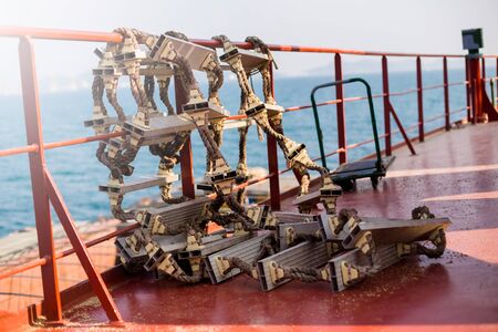 Rope ladder on cargo ship. Shipment from a merchant ship to a small ship.の写真素材