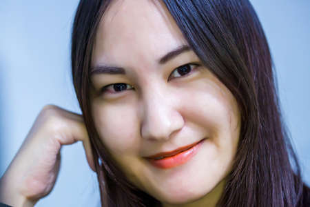 Asian woman is smile happily. The concept of beautiful and happiness.
