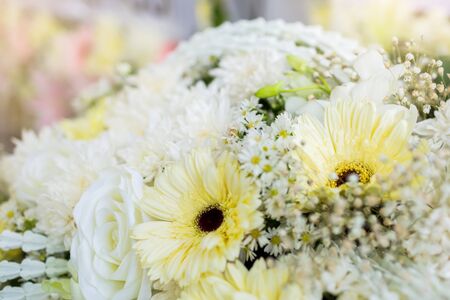 Selective focus to fresh flower bouquet. Botanic composition for wedding or greeting. Bouquet in multi color of beautiful mixed flowers. Excellent garden flowers in the arrangement.の写真素材
