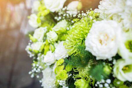 Selective focus to fresh flower bouquet. Botanic composition for wedding or greeting. Bouquet in multi color of beautiful mixed flowers. Excellent garden flowers in the arrangement.の写真素材