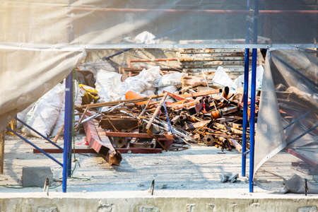 Scrap iron on construction site. construction waste.の写真素材