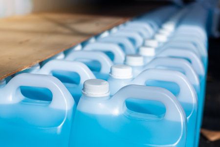 Alcohol for cleaning and sanitizing is contained in gallons in the warehouse.の写真素材