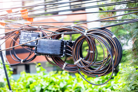 Selective focus to roll of fiber optic cable with blurry connector box. Communication wiring cable.の写真素材