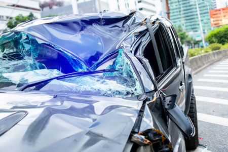 The condition of the damaged vehicle in the accident. Safety glass shattered after car was hit.の写真素材