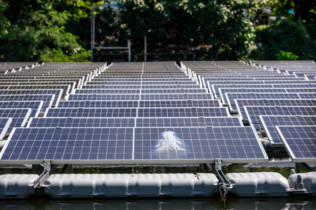 Selective focus to damaged solar panels. Solar photovoltaic power station on water. Solar panels or...