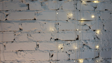 White brick wall with light bulbs, backgroundの写真素材