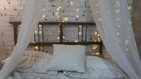 Festive bedroom decoration, garland bed, christmas, new Yearの写真素材