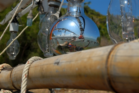 Reflection of the Lamp lure fishing  On a small fishing boat in Thailand の写真素材