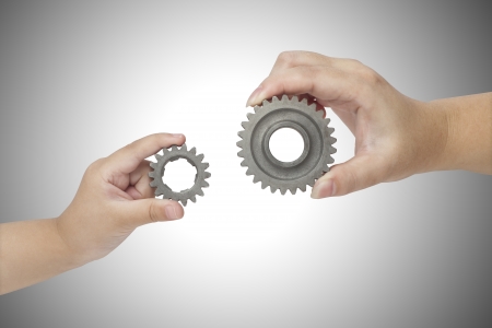 Hands holding gearの写真素材