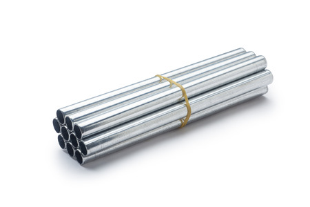 Bunch of metal pipes isolated on white backgroundの写真素材