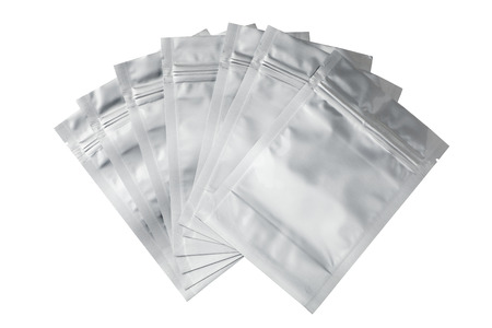 Foil food bag packaging with value and seal, Isolated on white.の写真素材